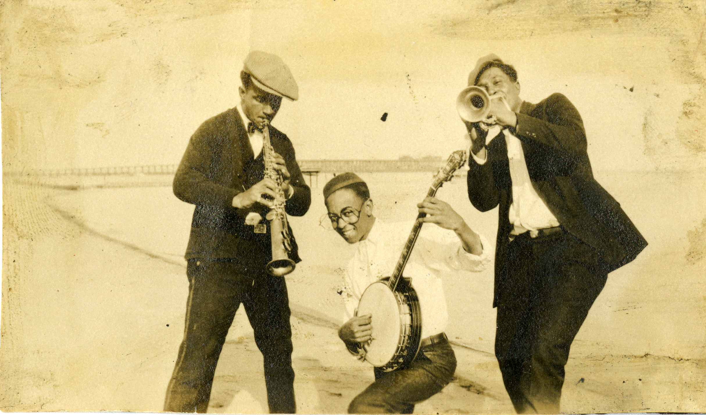 Lee Collins, Danny Barker, and Arthur Derbigny on the beach in Pensacola, Florida; 1928
